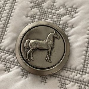 Silver horse belt buckle